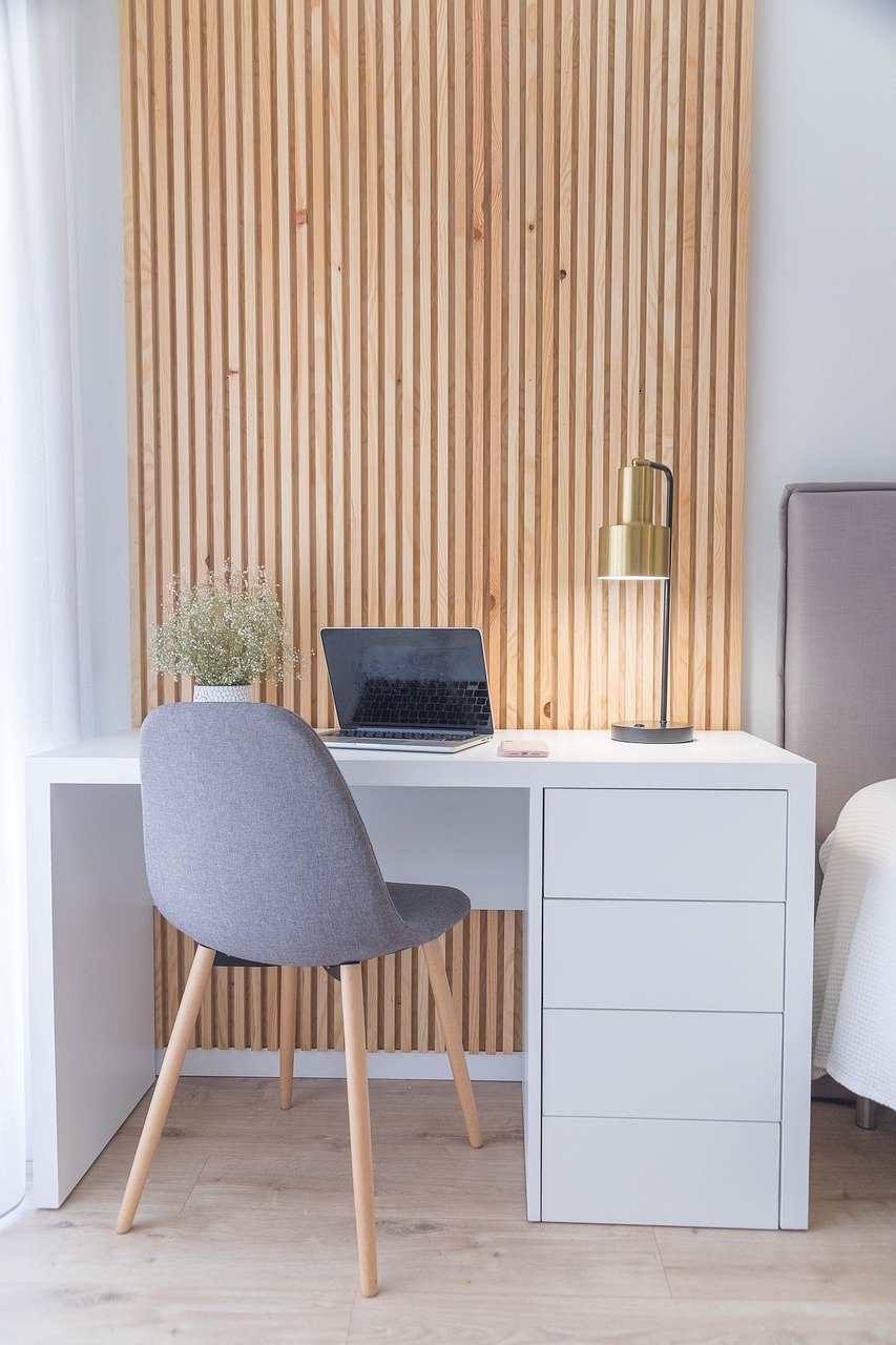 Ultimate Checklist for Preparing Your Home for Sale: Room by Room Guide desk staged by bed photo