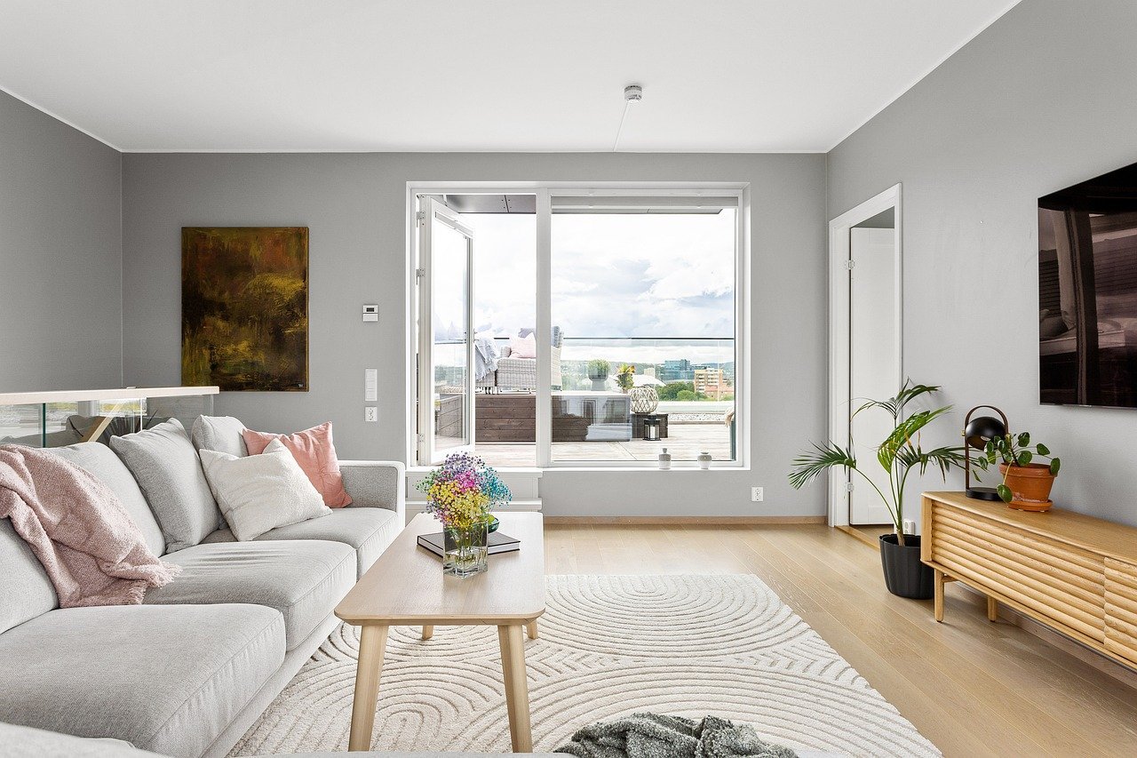 How to Stage Like a Pro Using Neutral, Updated Rugs real estate, interior, house, luxury, sofa, living room, table, floor, wooden, chair, decor, pillow, cabinet, bed room, bathroom, kitchen, view, window, art, design, hallway, lamp, carpet, shelf, home