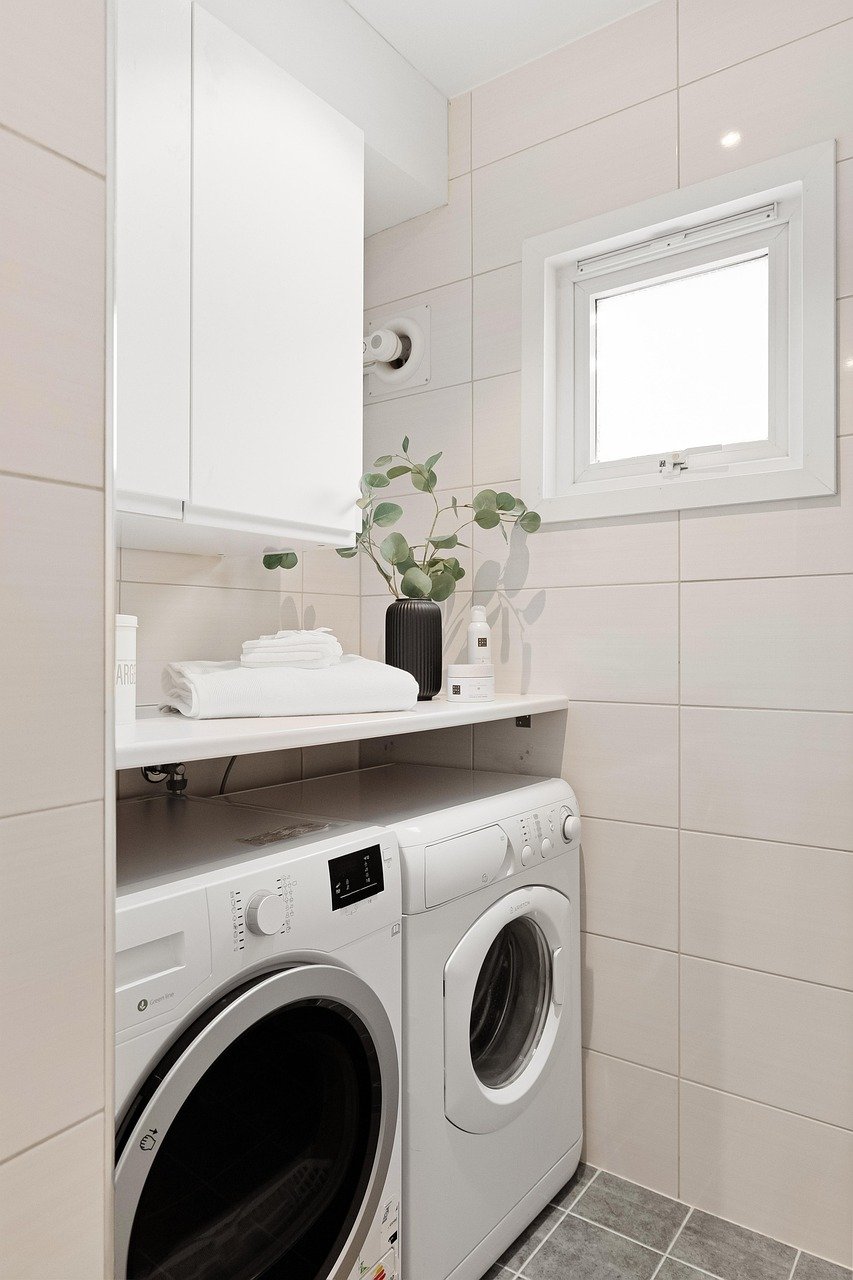 Ultimate Checklist for Preparing Your Home for Sale: Room by Room Guide laundry room staged photo