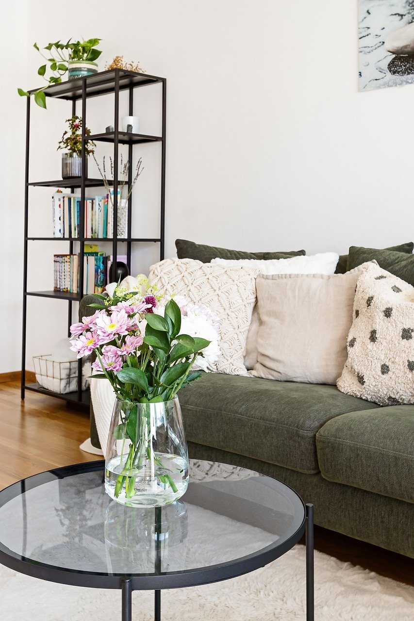 upclose of sofa and bookshelf in living photo